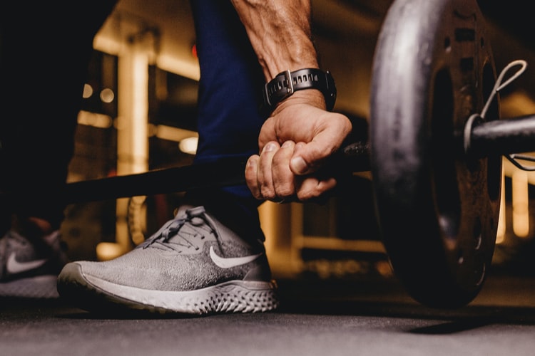 man preparing to lift weight