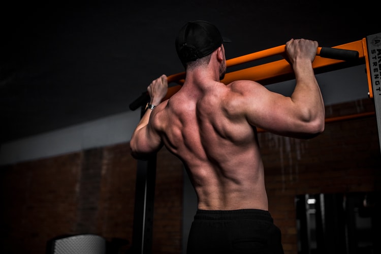 man pushing up his body