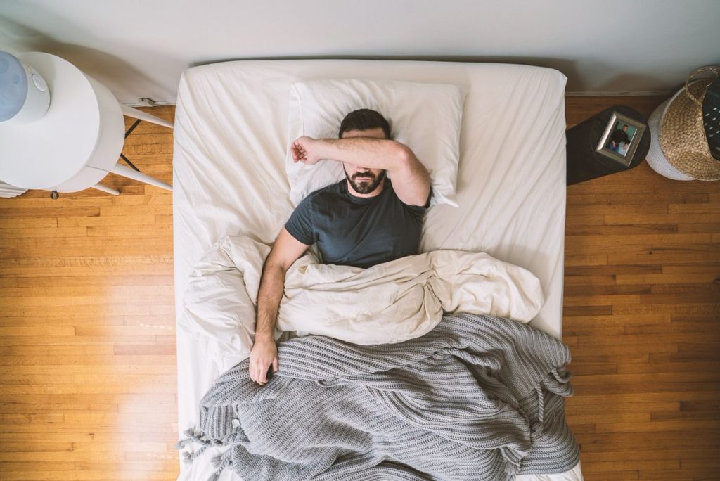 The Man Sleeping In The Bed Night Time