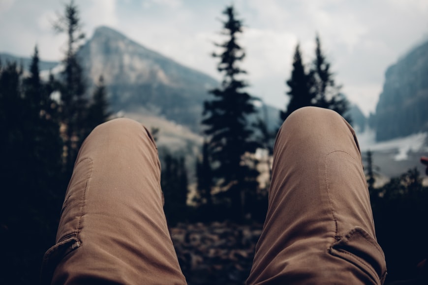 Man Laying down in the forest