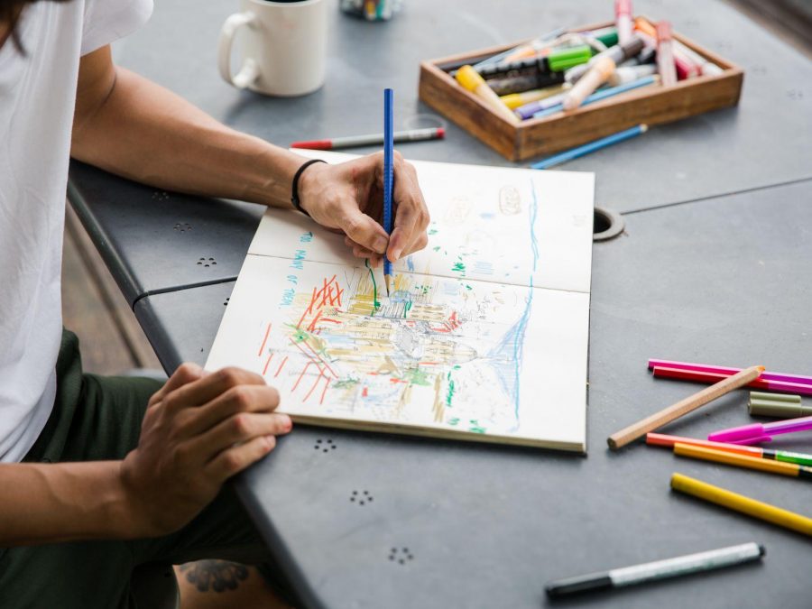 Man drawing on paper  