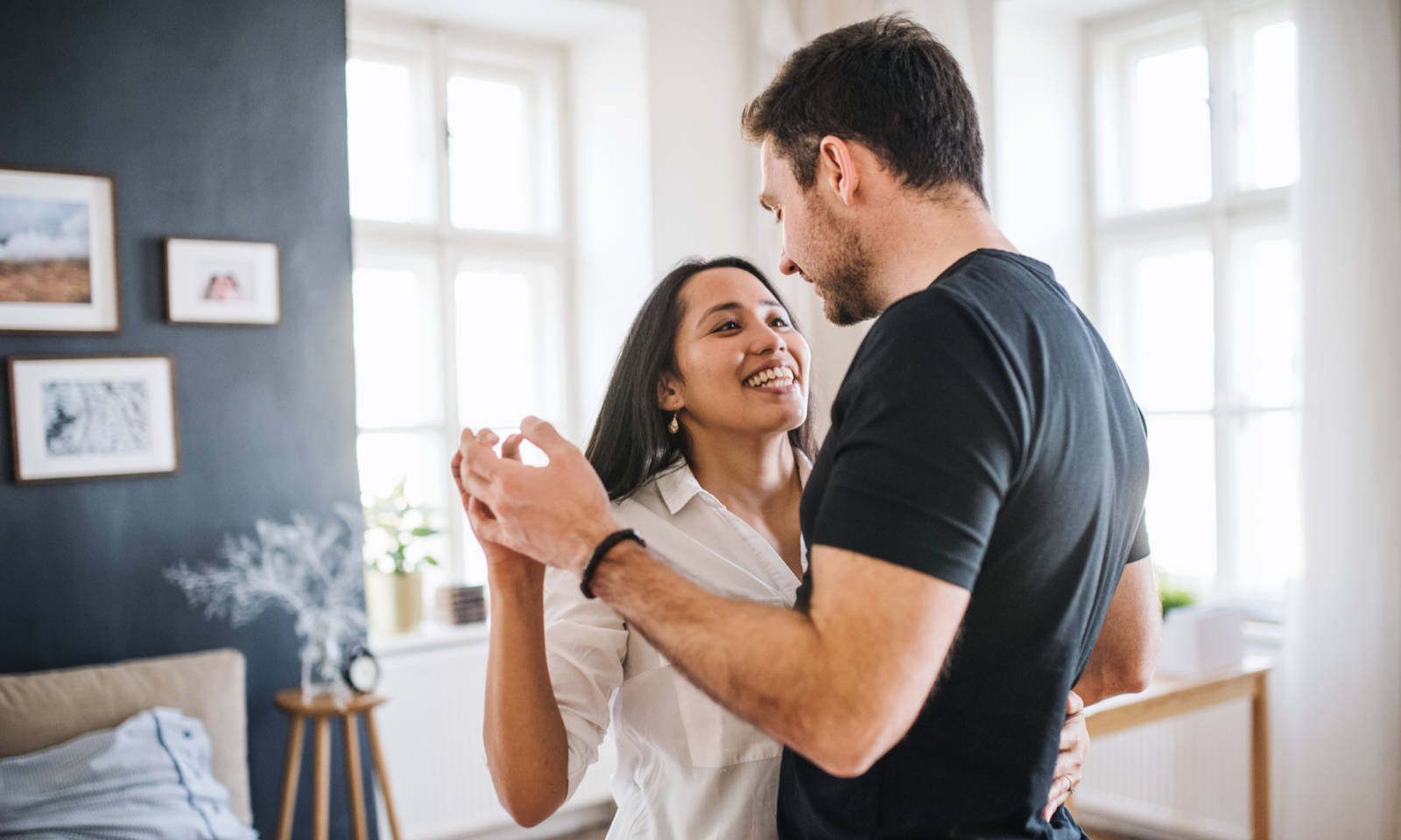 couple dancing at home