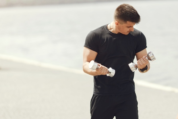 Man Performing An Early Morning Workout 