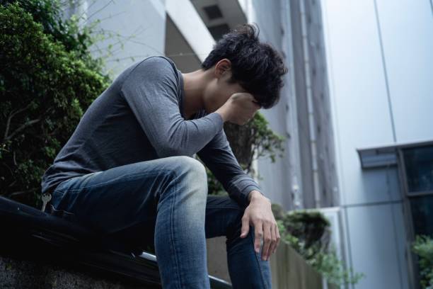 sitting alone with stuck on something.