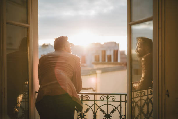 Young Man Looking At Sunrise 