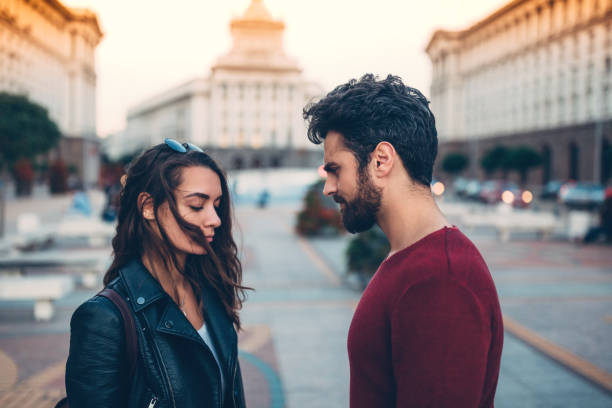 Man and woman arguing at the street