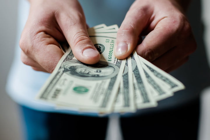Man Holding Money 