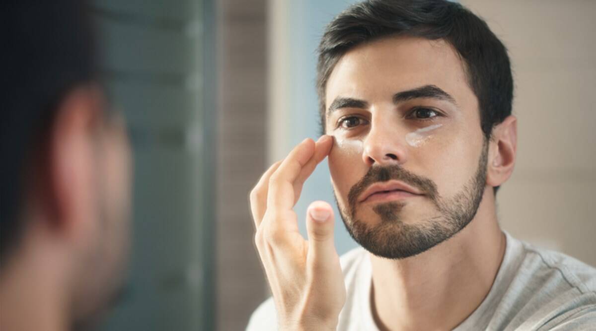 Man Applying Sunscreen 