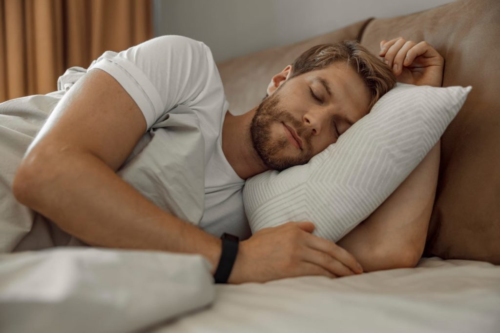 The Man Sleeping In The Bed Night Time
