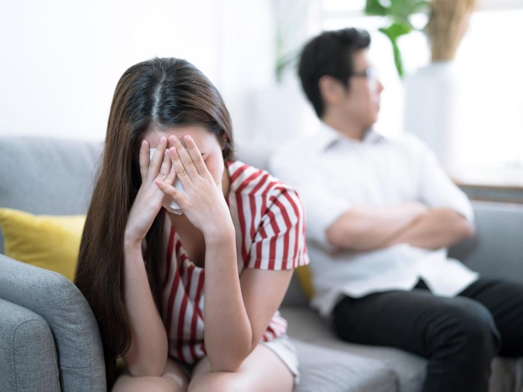 Unhappy Young Couple Arguing