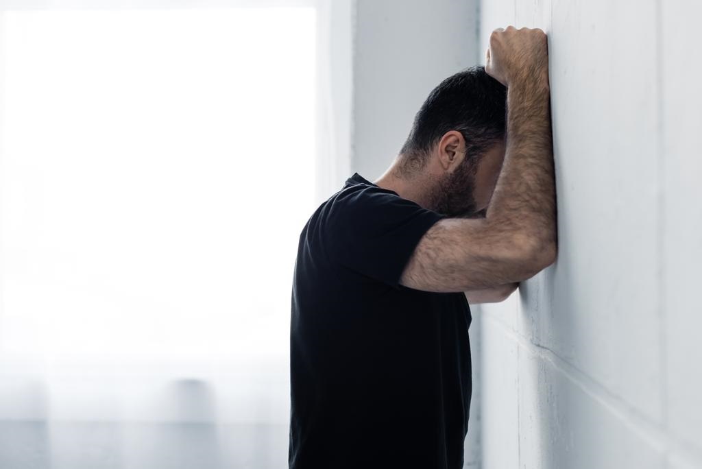  Adult Depressed Man In Black T-shirt Suffering