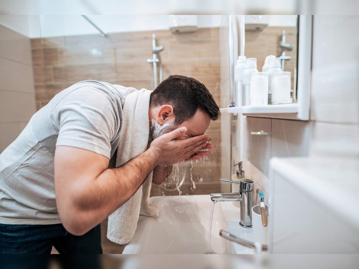 Man Cleaning Face  