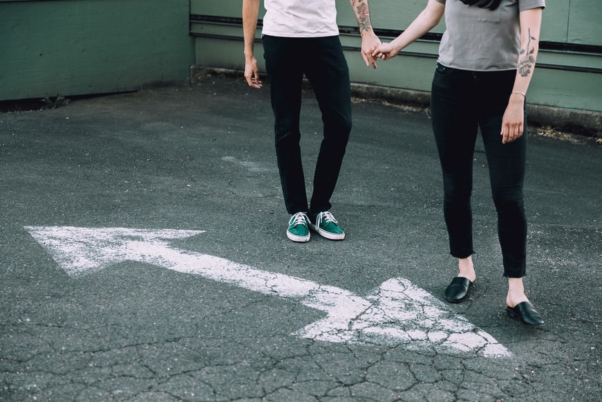 Couple holding hands