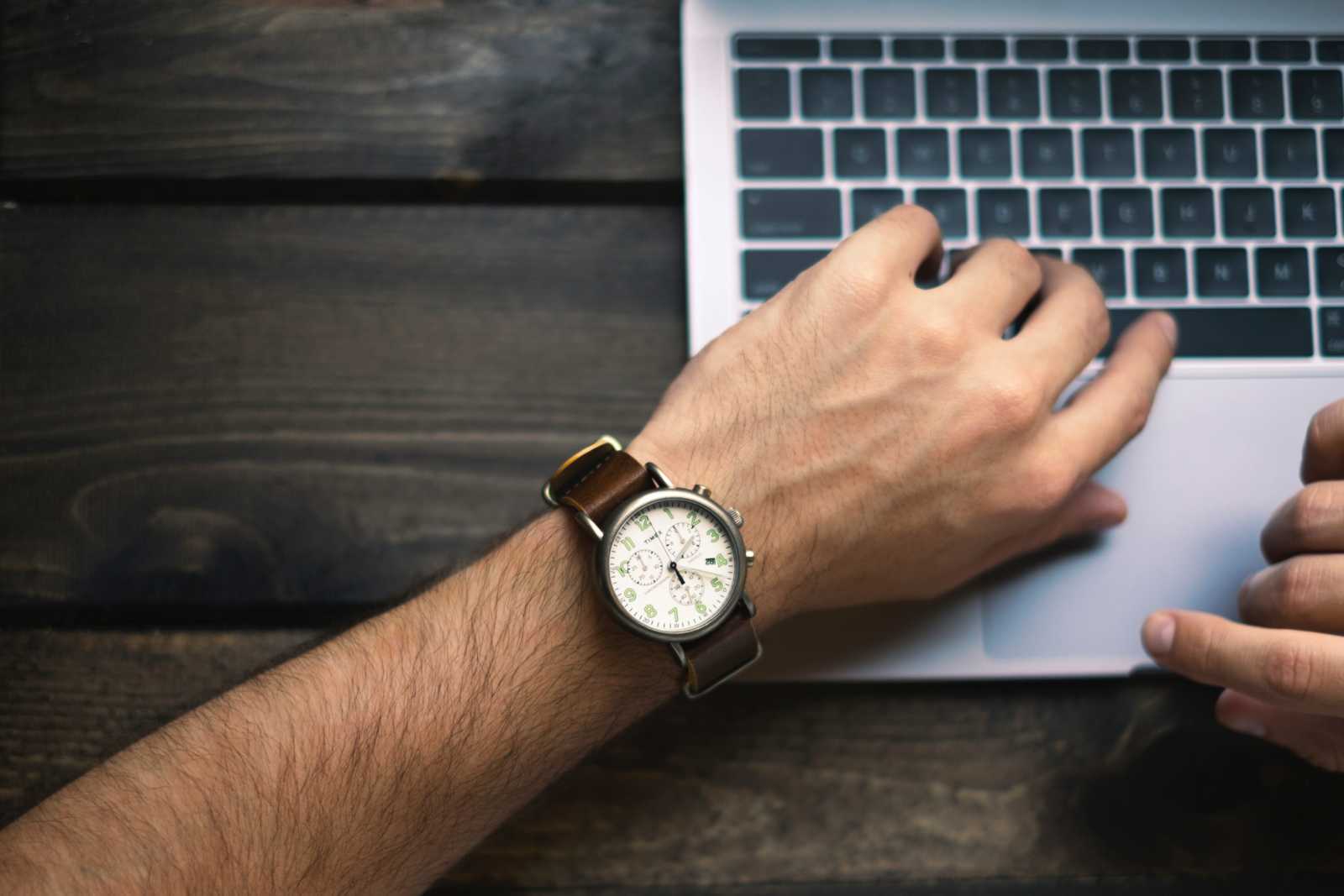man looking the watch 