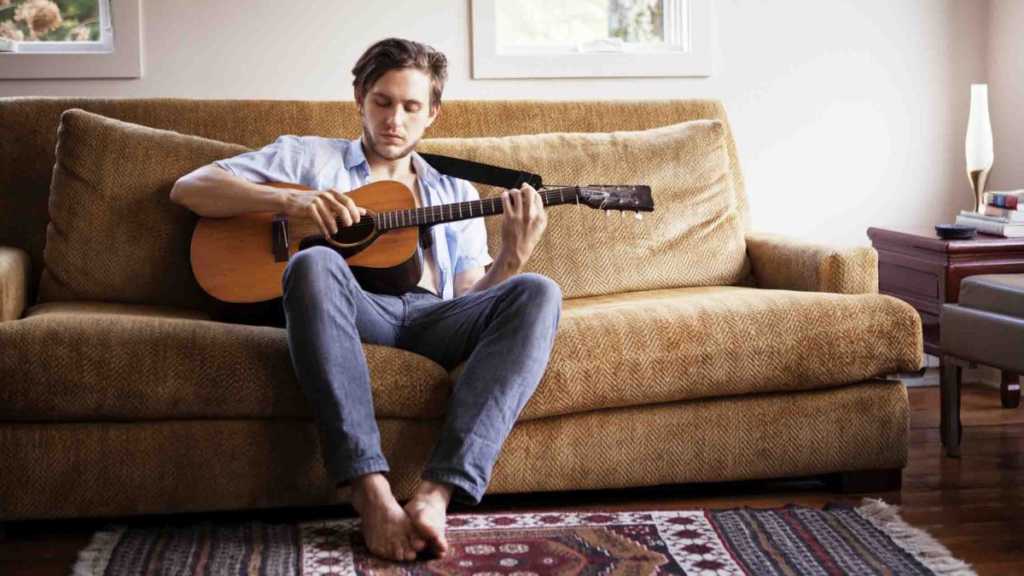 man playing guitar 
