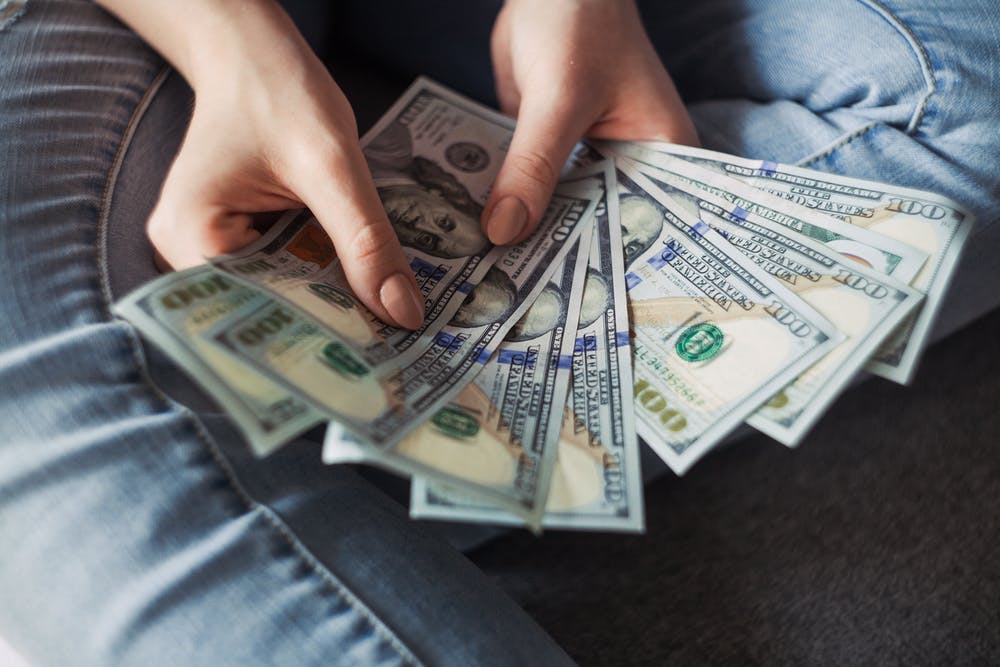 man holding Money