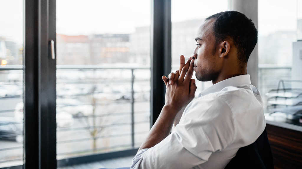 man sitting thinking
