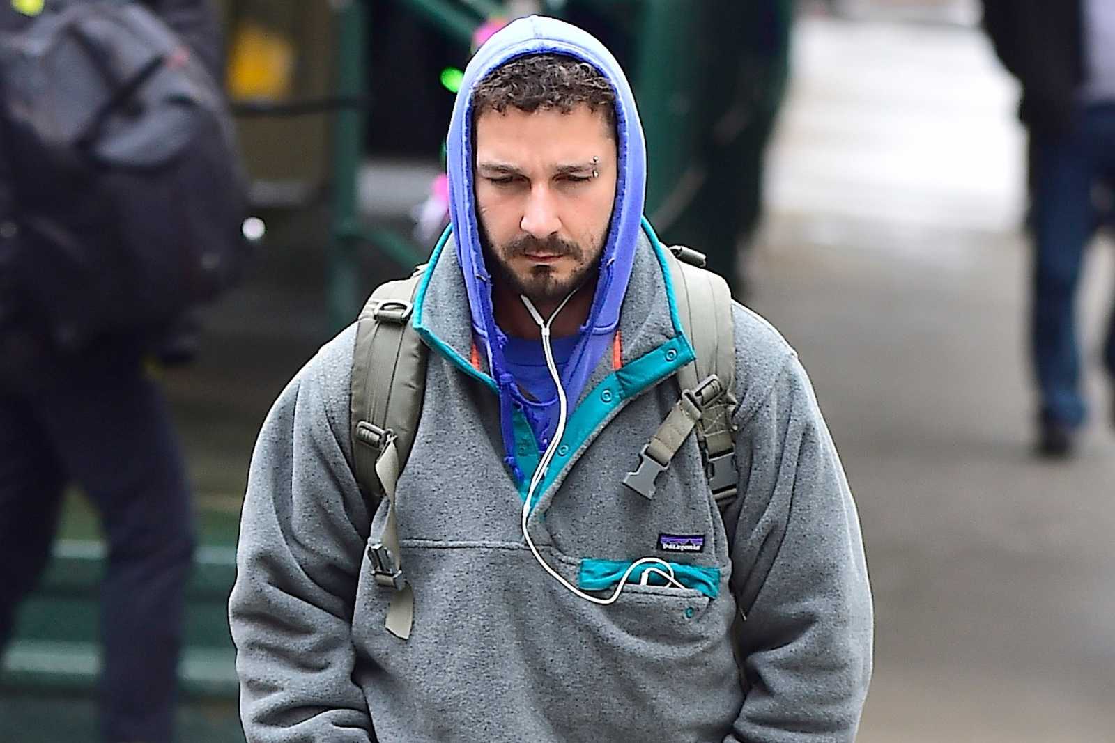  man wearing hoodie 