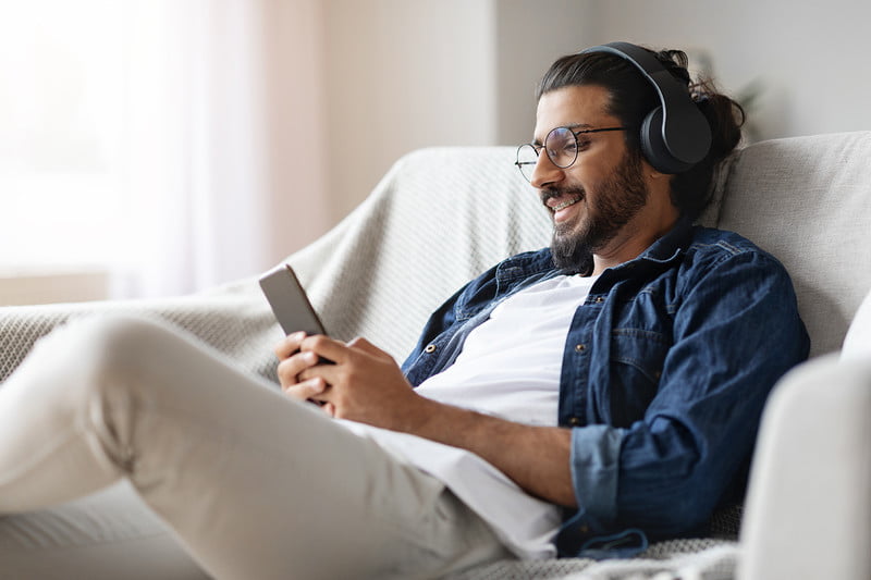 man listen Podcasts 