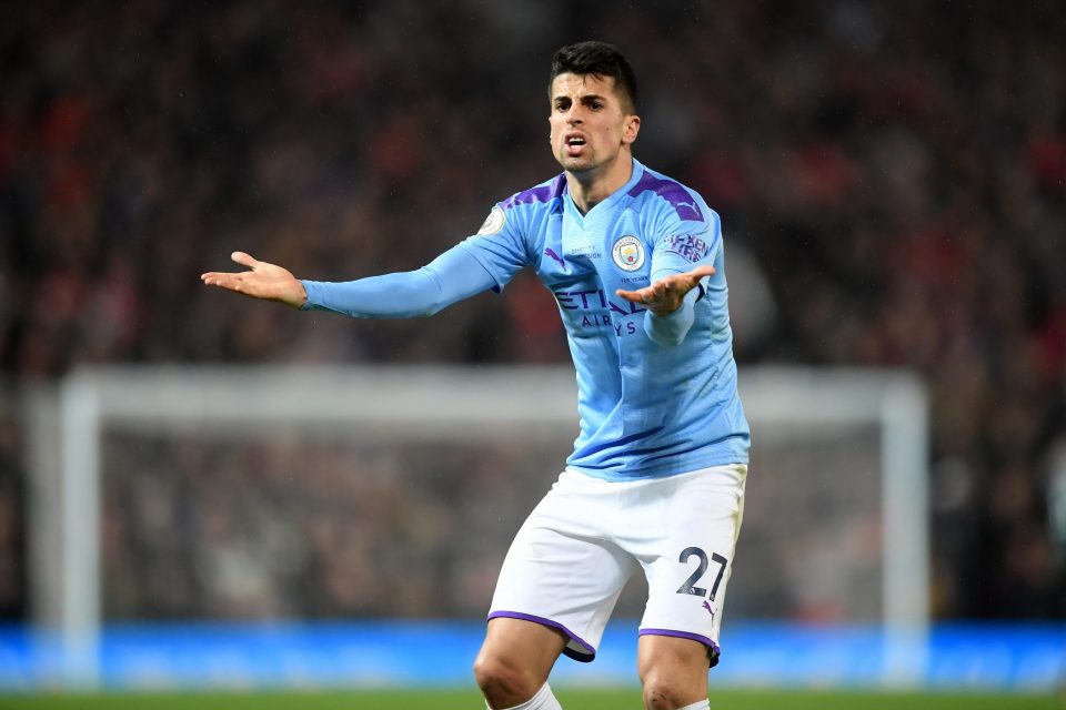 Manchester City defender Joao Cancelo reveals he was ATTACKED by 'four cowards who managed to take all my jewellery' while at home with his family... as police investigate after he suffered a nasty cut to his head