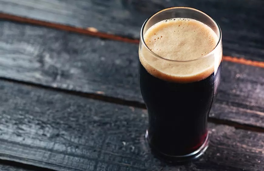 Dark and heavily carbonated beer