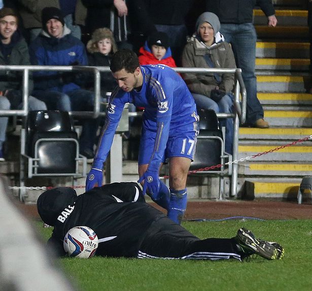 Hazard kicked ball boy