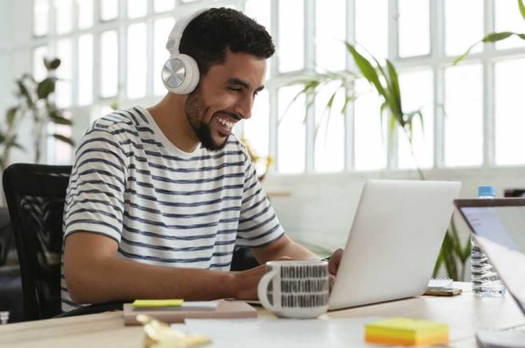 man Listening Music at work 
