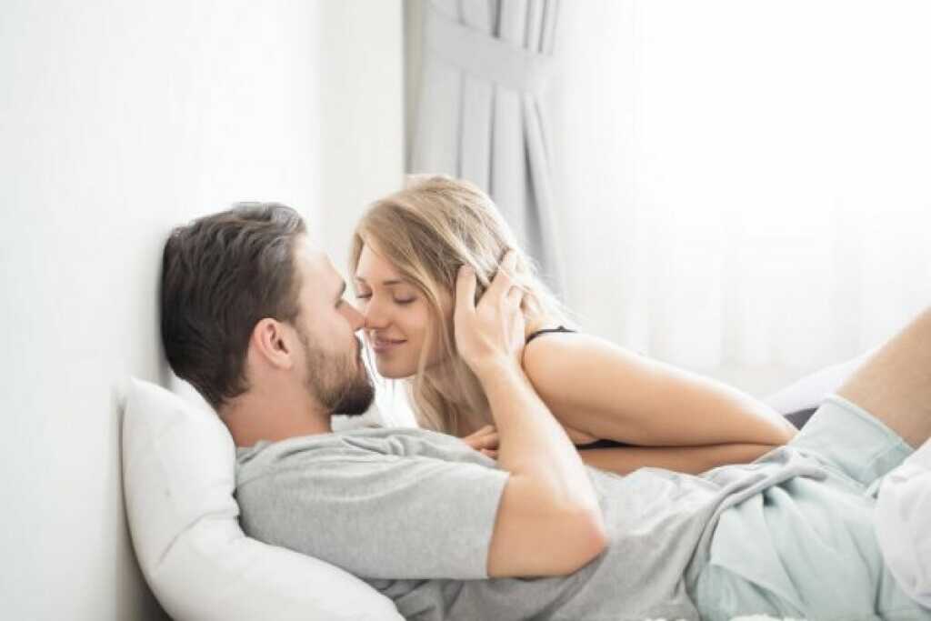 Kissing in bed