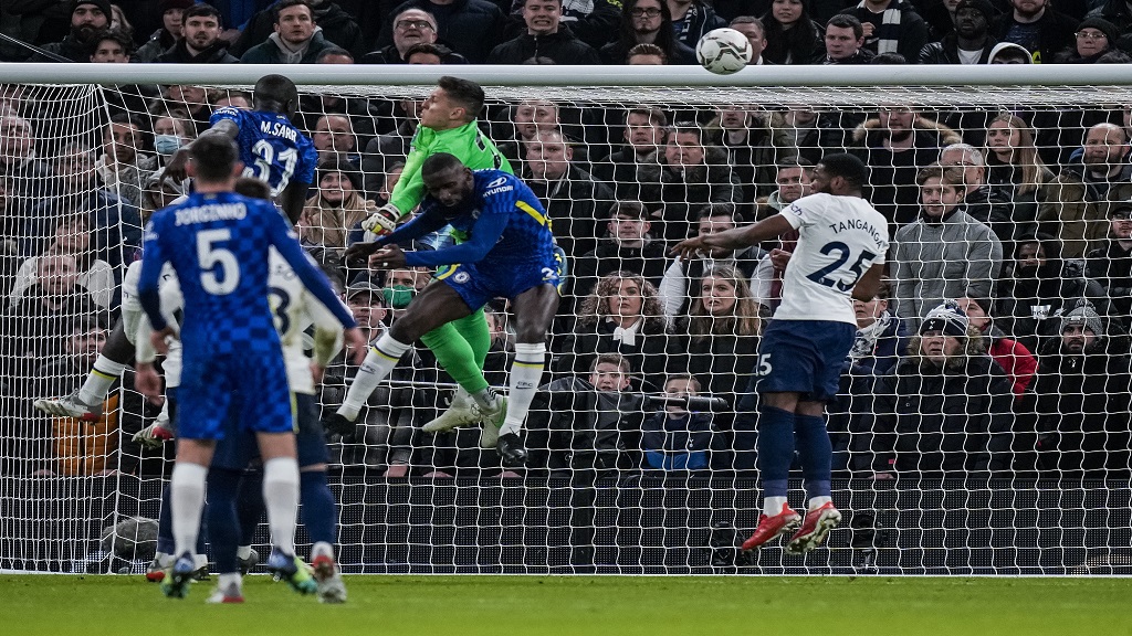 Chelsea's Antonio Rudiger, center and foreground, scores the opening goal during the English League Cup semifinal second leg soccer match between Tottenham Hotspur and Chelsea at the Tottenham Hotspur Stadium in London, Wednesday, Jan. 12, 2022. (AP Photo/Alastair Grant)