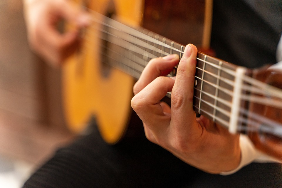 man playing guitar