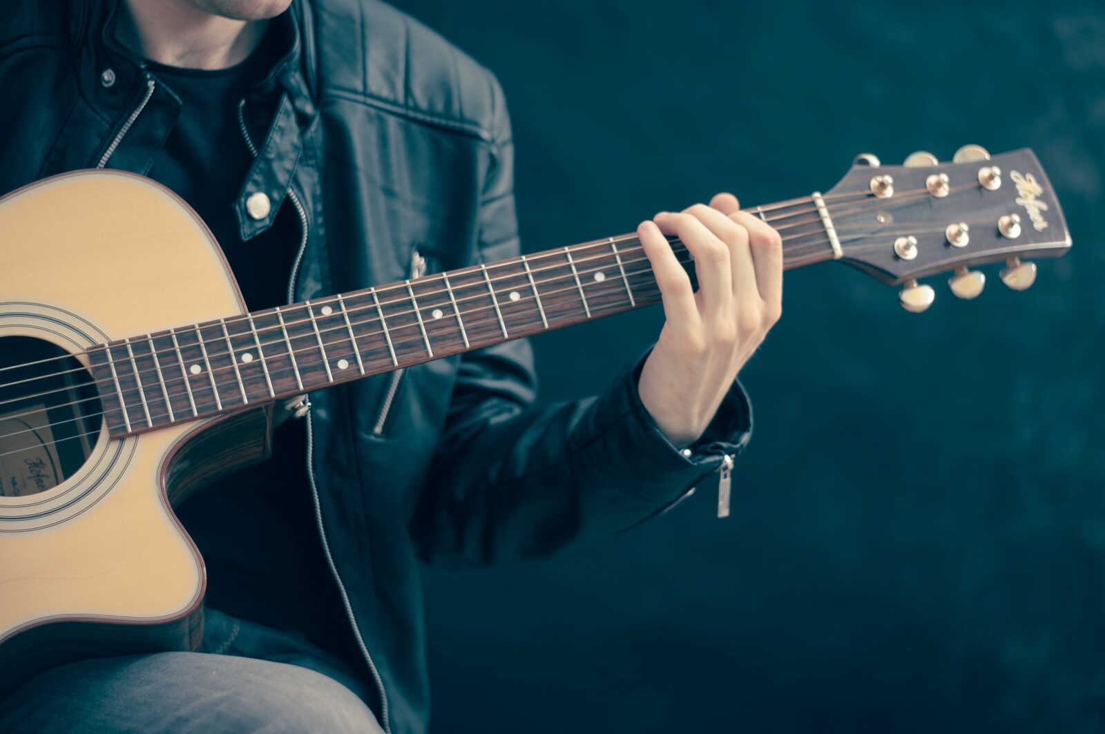 man playing guitar