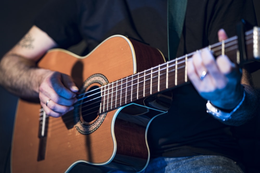 man playing guitar