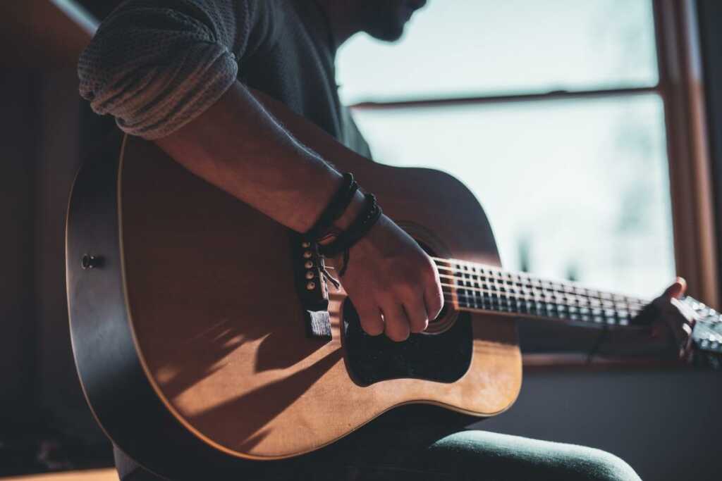 man playing guitar