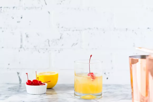 making cocktail from whiskey