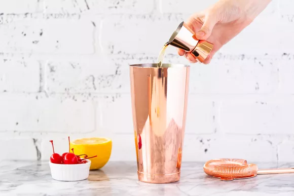 making cocktail from whiskey