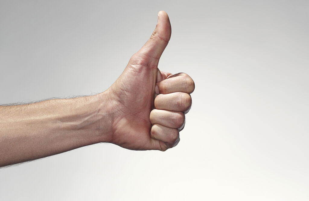 Hand giving the thumbs up