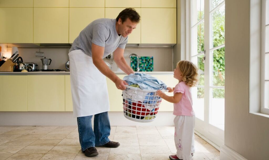 child helping her dad