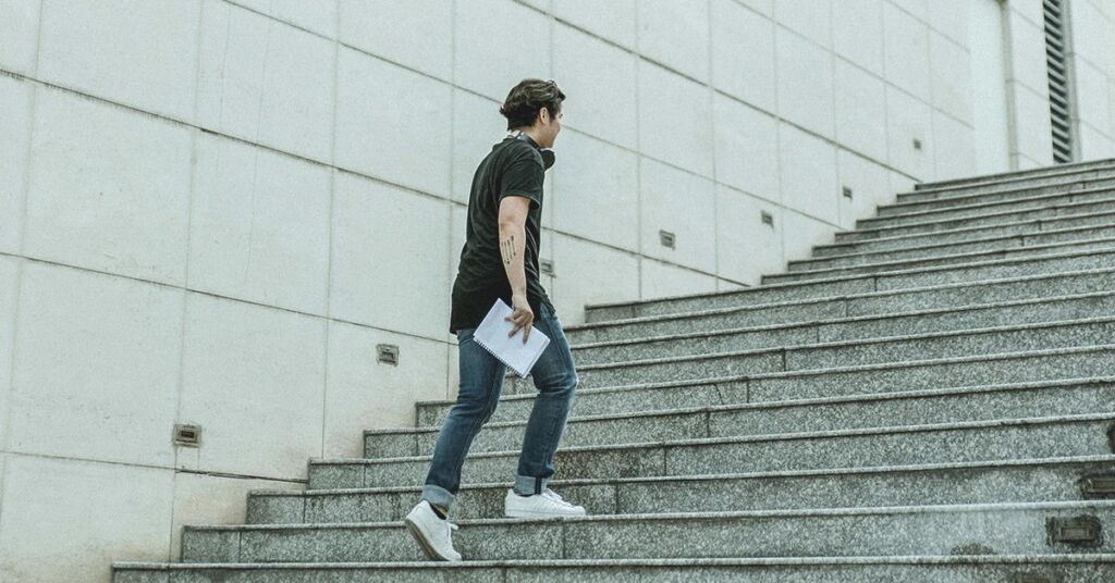 man Taking the stairs