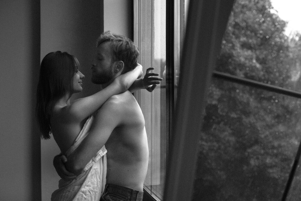romantic couple inside side view